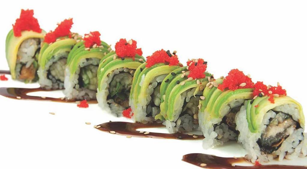 Dragon Roll · Eel, cucumber, topped with avocado, caviar, eel sauce