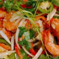 Salt & Pepper Prawns · Salt and pepper prawns wok seared with onion, bell peppers and jalapenos served with rice on...