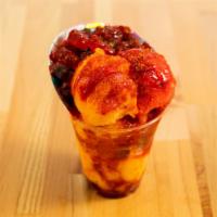 Gummy Yummy · Sorbet topped with gummy bears, cherry powder, chamoy, and chile-lime powder.