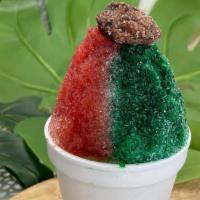 Chango · Shaved ice, pickle juice, red and green chamoy, saladito, and chile-lime powder.