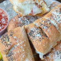Pepperoni Rolls · Our take on a dish that originated in west virginia. It's our most popular menu item and cha...