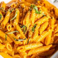 Penne Alla Vodka · Penne pasta served in a delicious creamy vodka marinara.