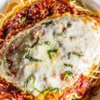 Chicken Parmesan · Panko breaded chicken topped with marinara and mozzarella served with spaghetti.
