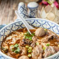 Beef Noodle Soup · Rice noodles, sliced beef, and bean sprouts in seasoned beef broth. Garnished with cilantro,...