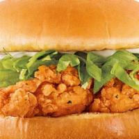 Chicken Tender Sandwich · Two tender, juicy all white meat chicken strips topped with fresh shredded lettuce and cream...