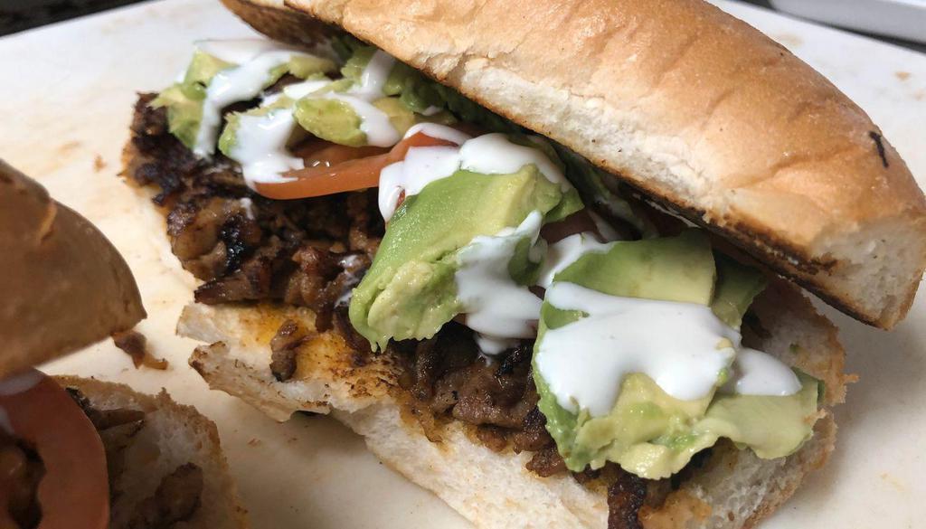 Tortas · Torta comes with your choice of meat, lettuce, tomatoes, avocado, cheese and sour cream. Torta viene con carne de su gusto, lechuga, tomate, aguacate, queso y crema.