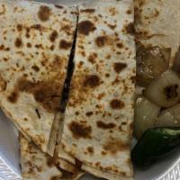 Veggie Quesadilla Large · Large Cheese Quesadilla on a crispy flour tortilla. Build your own quesadilla with our veget...