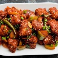 Chilly Chicken · Popular indo-chinese side and starter dish that is made with Chicken, onion and capsicum tos...