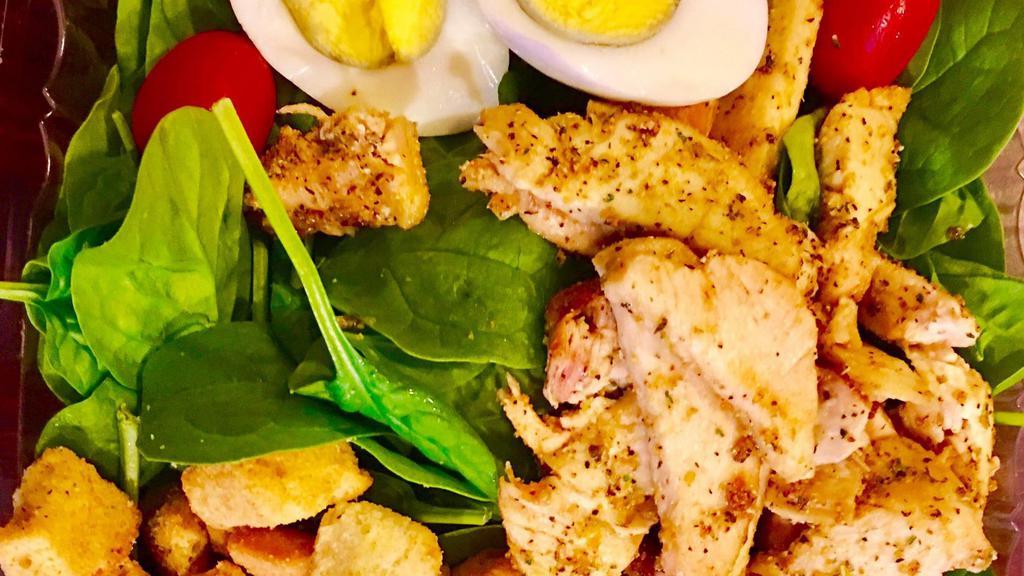 Baby Spinach Salad · Baby spinach, grape tomatoes, grilled chicken, boiled egg, bacon bits, croutons with French dressing.