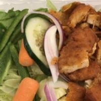 Buffalo Chicken · Tossed salad with grilled chicken marinated in buffalo sauce. Choice of blue cheese or ranch.