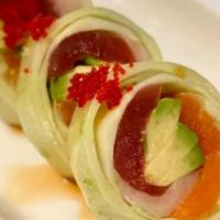 Naruto Roll · Tuna, salmon, crab, avocado, tobiko wrap with cucumber sheet with ponzu sauce.