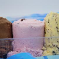 Triple Scoop Ice Cream · Select up to three ice cream flavors. Add toppings for an additional charge.