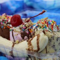 Banana Split Sundae · Select any three scoops of ice cream, banana, whipped cream, toppings-walnut, sprinkles. Cho...