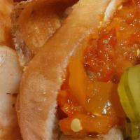 Hot Honey Dog · Our latest creation includes our hand crafted jerk chicken or vegan hot dog topped with pick...