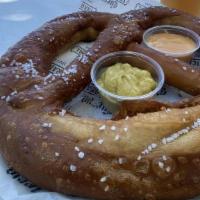 Giant Bavarian Pretzel · Vegetarian. Deep fried and served with beer cheese and spicy mustard