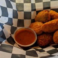 Jalapeno Poppers · Vegetarian. Breaded and fried jumbo jalapeños stuffed with your choice of cheddar or cream c...