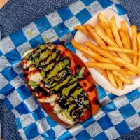 Caprese Dog · Our all beef 1/4lb hot dog topped with fresh mozzarella cheese, cherry tomato, and house mad...