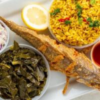 Whole Red Snapper With Bon  · Served with fries or Cajun rice, coleslaw, and bread.