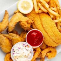 3Items Fish & Chicken Combo  · All dinners served with fries or Cajun rice, coleslaw, and bread.