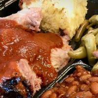 Texas Sliced Beef Brisket Platter · w/choice of two sides & Cornbread