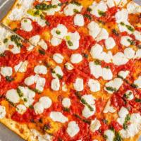 Thin Crust Brooklyn Square Pizza · Mozzarella cheese, fresh mozzarella cheese, plum tomato sauce & basil.