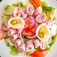 Antipasto Salad · With ham, salami, provolone cheese & green olives.