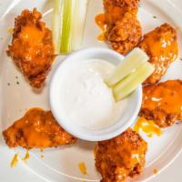 Buffalo Wings · Choice of sauce extra sauce for an additional charge.
