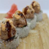 Torched Crunch Spicy Tuna-4Pcs · california roll topped with torched spicy tuna, crunch, spicy mayo and eel sauce