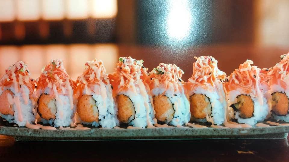 Red Monster · Spicy tuna, cucumber, topped with salmon, spicy crab salad, red tobiko, spicy mayo