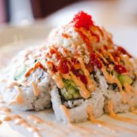 Volcano (Spicy) · California roll, seaweed salad, tuna, salmon, red snapper, and whitefish​ all mixed with spi...