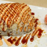 Crunch Spicy Salmon Roll · Spicy salmon, cucumber, topped with crunch, spicy  mayo and eel sauce