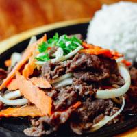 Beef Bulgogi(Korean Bbq) · Thin sliced of prime sirloin marinated in house special sauce served on a sizzling platter.