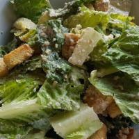 Caesar Salad     Romaine Lettuce, Parmesan Cheese. · Romaine lettuce, Parmesan cheese.