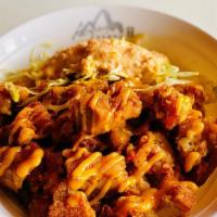 Crispy Chicken Don · Crispy fried chicken served on crispy cabbage. Drizzled with spicy mayonnaise, and a sprinkl...