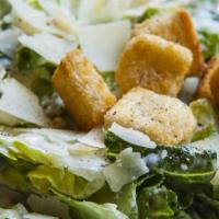 Caesar Salad · Romaine, parmesan and croutons with Caesar dressing on the side.