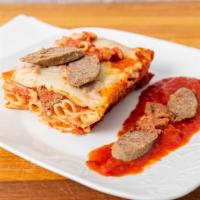 Baked Ziti With Sausage · Served with garlic bread.