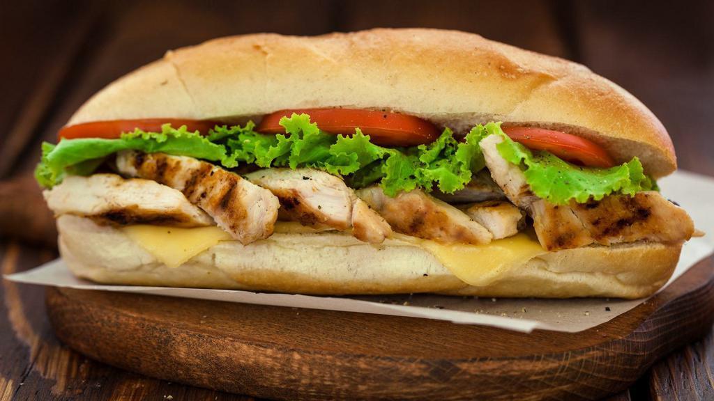 Pesto Chicken Sub · Craveworthy chicken breast sub with lettuce, tomatoes, light balsamic glaze, basil pesto and melted provolone.