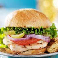 Grilled Chicken Brioche Bun · Artfully grilled chicken with lettuce, dill pickles, sliced tomatoes, chipotle mayo, provolo...