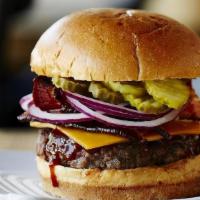 Wild West · Our custom Beef Blend Patty topped with Cheddar Cheese, Applewood Smoked Bacon, Pickles, Red...