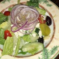 Greek Salad (Small) · Top menu items. Romaine, lettuce topped with crumbled feta cheese, stuffed grape leaves, Kal...