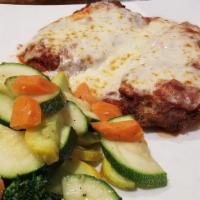 Chicken Parmigiana · Served with side of penne pasta or spaghetti.
