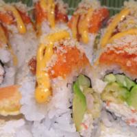 Hot Night Roll · Hot and spicy. In: shrimp tempura, crab meat, avocado, cucumber. Out: spicy tuna, tempura fl...