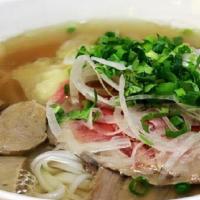 Phở Đặc Biệt (Combination Phở) · Rice noodles in beef bone broth  w/ combination of sliced rare steak, beef brisket and beef ...