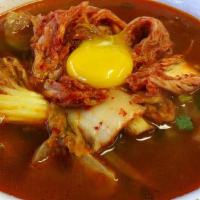 Phở Kimchi (Kimchi Phở) · Rice noodles in beef bone broth  w/ beef brisket, meatball, rare steak, egg and kimchi.