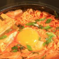 Kimchi Ramen - Mì Kimchi · Spicy Kimchi soup with ramen, sliced rare beef, beef meatballs and egg.