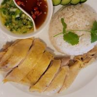 Cơm Gà Hải Nam - Hai Nam Chicken Rice · NEW ITEM ! Seasoned steam chicken served with ginger onion sauce and white rice.