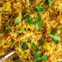 Vegetable Biryani · Basmati rice cooked with fresh vegetables, cashew nuts and golden raisins