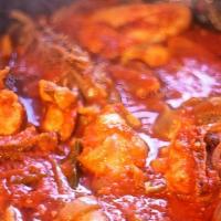 Stew With Chicken · Savory tomato stew with chicken ingredients: tomato, onion, garlic, pepper, spices, ginger