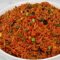 Jollof Rice With Veggies · Mixed veggies added to savory Jollof rice  ingredients: tomato, onion, garlic, pepper, spice...