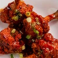Lollipop Chicken · Chicken wings in spicy dhaba sauce.